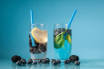 fresh summer drink with berries and lemon