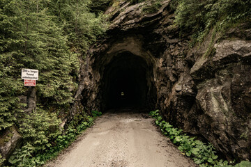 long dark tunnel in the mountains