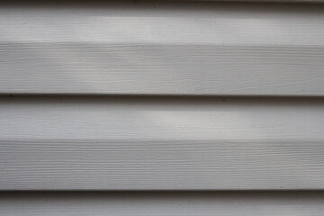 Part of wall from plastic siding close up, background image