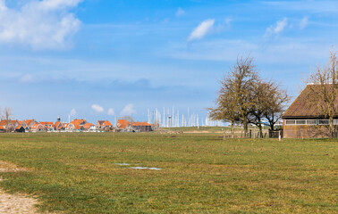 Townscape and field in Hindeloopen,  Netherlands