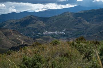 Fototapeta na wymiar town surrounded by mountains