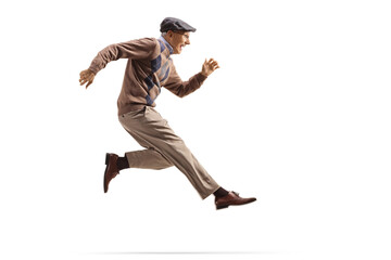 Excited elderly man jumping and kicking - obrazy, fototapety, plakaty