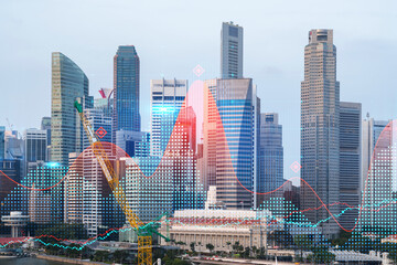 Obraz premium Forex and stock market chart hologram over panorama city view of Singapore, the financial center in Asia. The concept of international trading. Double exposure.