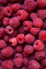 Fresh raspberries close up abstract background