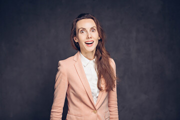 Concentrated caucasian woman on dark background