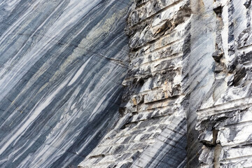 Natural marble texture, marble quarry, traces of production on stone