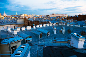Fototapeta na wymiar Roofs of Saint-Petersburg, Russia. Cityscape panorama of old central city part, view from a roof