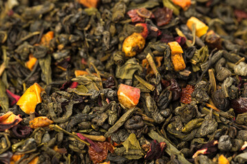  Leaves of Chinese Dry Tea Top Grade with Goji Berries and Powdered Acai on White Background