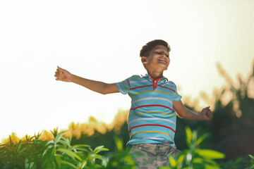 Happy indian child jumping in air