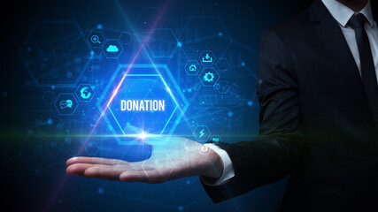 Man hand holding DONATION inscription, social media concept