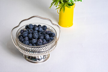 Ripe Blueberries in Silver Bowl