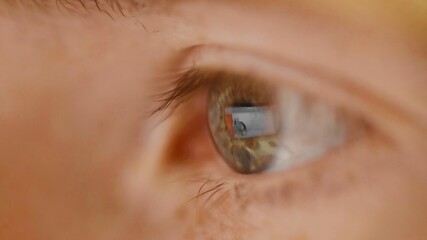 Close up shot of male Human brown eyes with 3D detail reflection