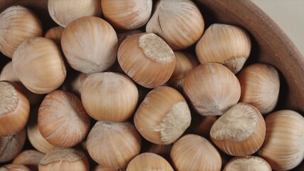 Hazelnut closeup in wooden bowl