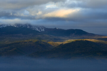 Impressive cloudy mountain landscape at sunrise.  View from Green Ridge Lookout in Central Oregon.