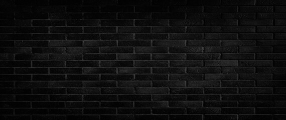 Black brick wall wide panorama of masonry