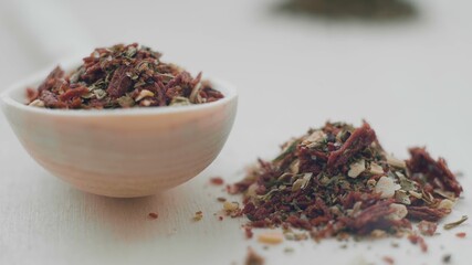 Variety of aromatic spices and herbs on kitchen table