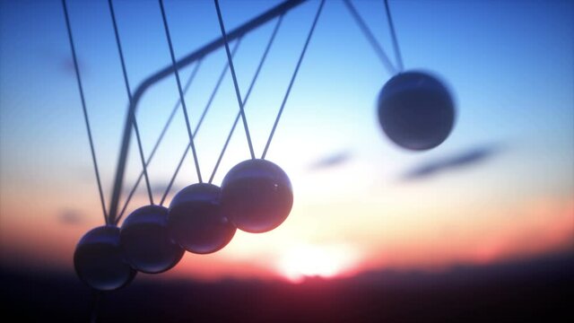 Seamless looping motion graphics with sound. Concept of conservation of momentum and energy.