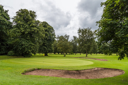 Flag marking the place a hole in a golf course