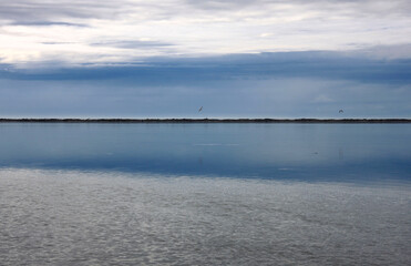 Fototapeta premium Pristine water scenes with reflections and brilliant blue skies