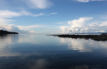 Pristine water scenes with reflections and brilliant blue skies