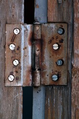 Rusted metal objects from vehicles and architecture with oxidation and traces of paint
