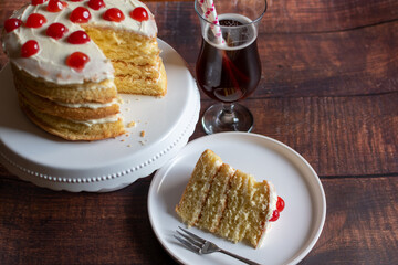delicious cherry cake with a sweet drink 