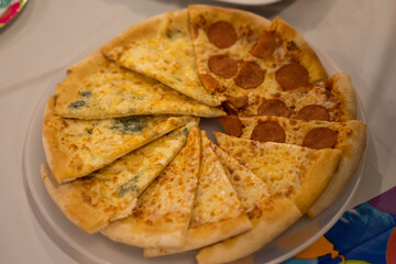 slices of pizza are on a plate