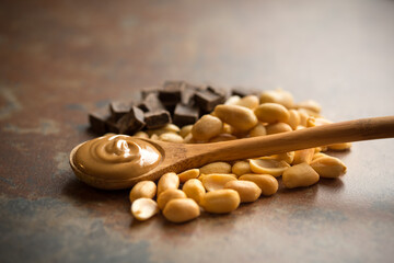 Wooden Spoon with Peanut Butter, Peanuts and Chocolate Chunks