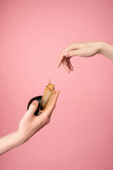 beautiful hands on  pink background, snail in  shell sits on  palm,  helping hand, perspective and hope, hand reaches for  snail, caring for animals, helping  weak, protection of loved ones, © Natallia Lipchanka