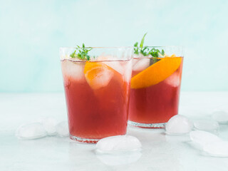 Fresh red coktail sangria in pitcher and glasses