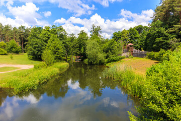 Fototapeta na wymiar View of Krutynia river in Iznota village near Beldany lake on sunny summer day, Mazury Lake District, Poland