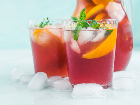 Fresh red coktail sangria in pitcher and glasses