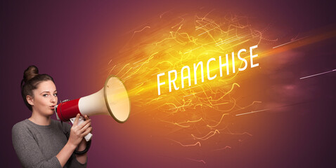 Young girld shouting in megaphone with FRANCHISE inscription, online shopping concept