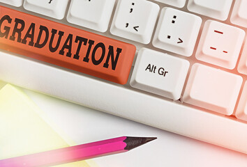 Text sign showing Graduation. Business photo showcasing the award or acceptance of an academic...