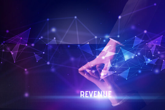 Businessman touching huge screen with REVENUE inscription, modern technology business concept