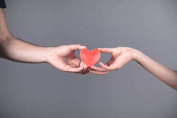 woman and man hand red heart
