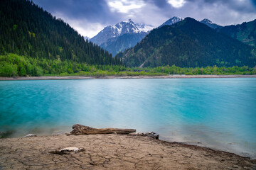 Amazing view of a mountain lake in front of a mountain range, Almaty city national park, Kazakhstan