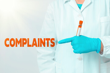 Handwriting text writing Complaints. Conceptual photo something that is the cause or subject of...