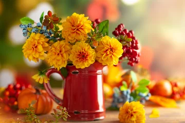 Poster Autumn floral still life with beautiful yellow dahlia in vintage red jug and pumpkins on the table. Autumnal festive concept. © Svetlana Kolpakova