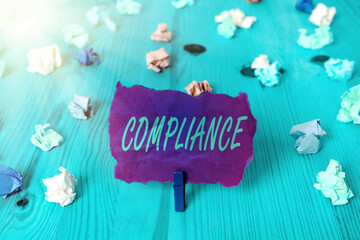 Text sign showing Compliance. Business photo text ability of an object to yield elastically when a...