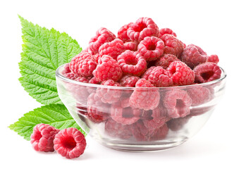 Ripe raspberries with green leaves in a plate on a white background. Isolated