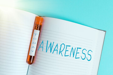 Writing note showing Awareness. Business concept for quality or state of being aware of knowledge...