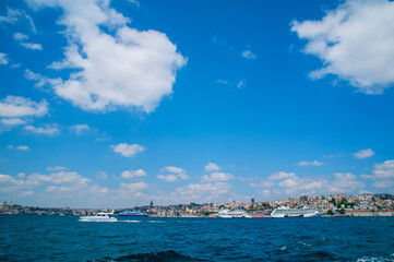 Obraz na płótnie Canvas Luxury cruise ship in Bosporus against galata tower, Istanbul.