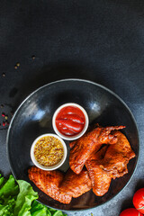 chicken wings smoked fried meat barbecue hen grill serving size. food background top view copy space organic eating