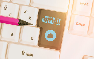 Text sign showing Referrals. Business photo showcasing act, action, or an instance of referring to...