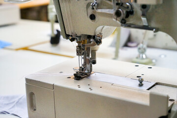 factory sewing machine with a needle close-up