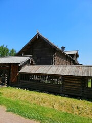 Saint-Petersburg,Russia-07.18.2020: The wooden ancient russian buildings.the Bogoslovka Estate park ensemble in Saint-Petersburg.