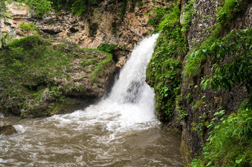 View of waterfall in Caucasus mountains