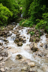 Waterfall in Cherek gorge in the Caucasus mountains in Russia