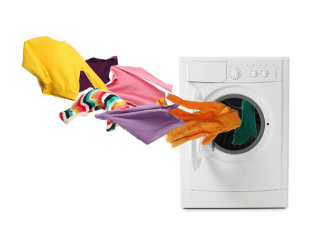 Washing Machine And Flying Clothes On White Background